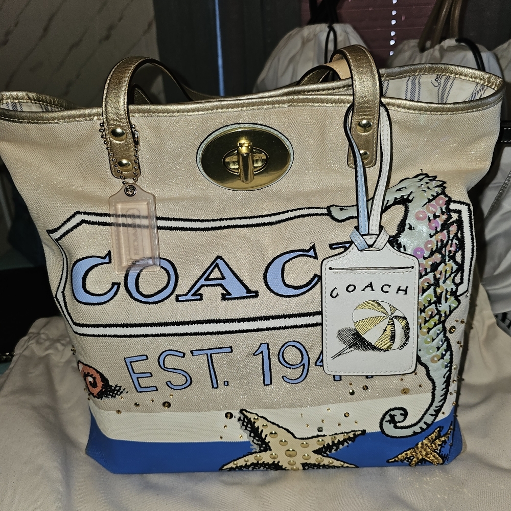Coach resort collection tote